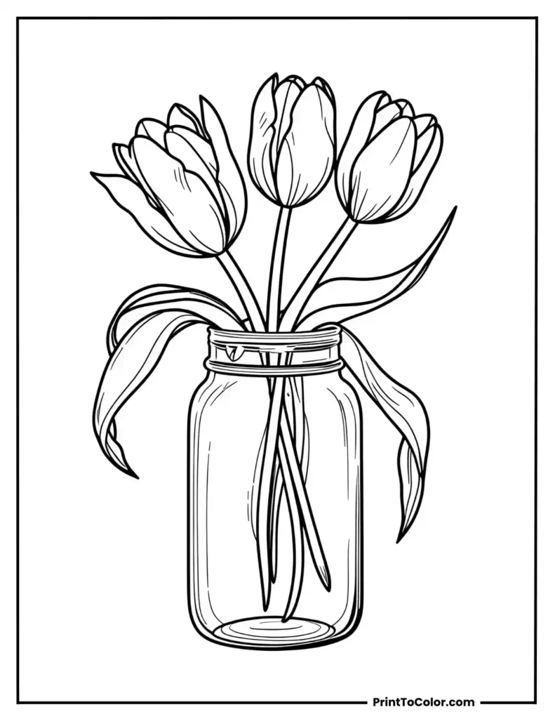 Three Tulips inside a glass jar
