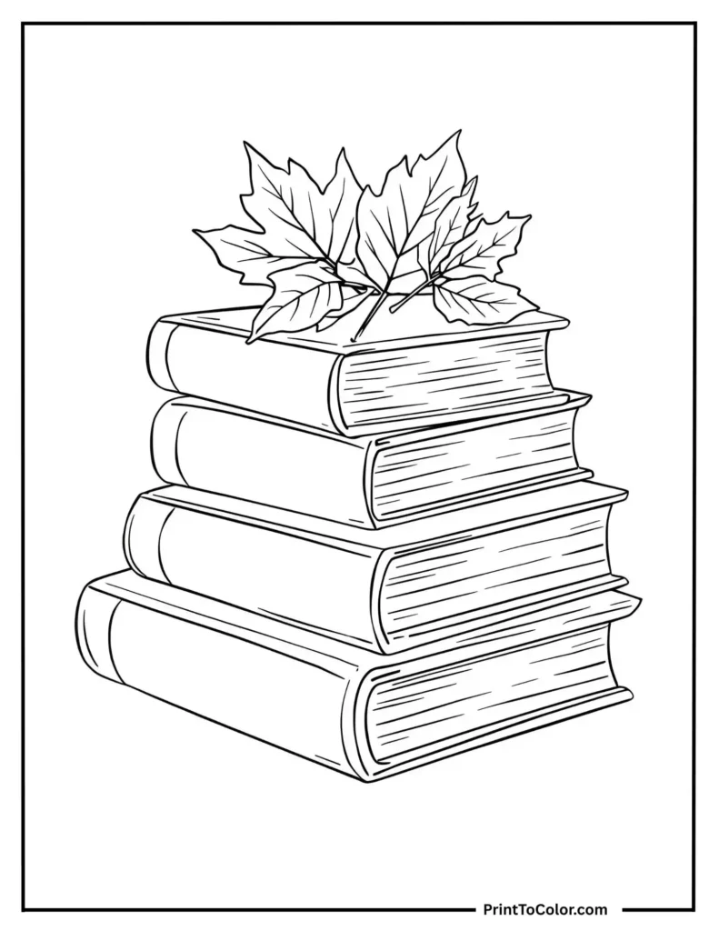 autumn leaves on books